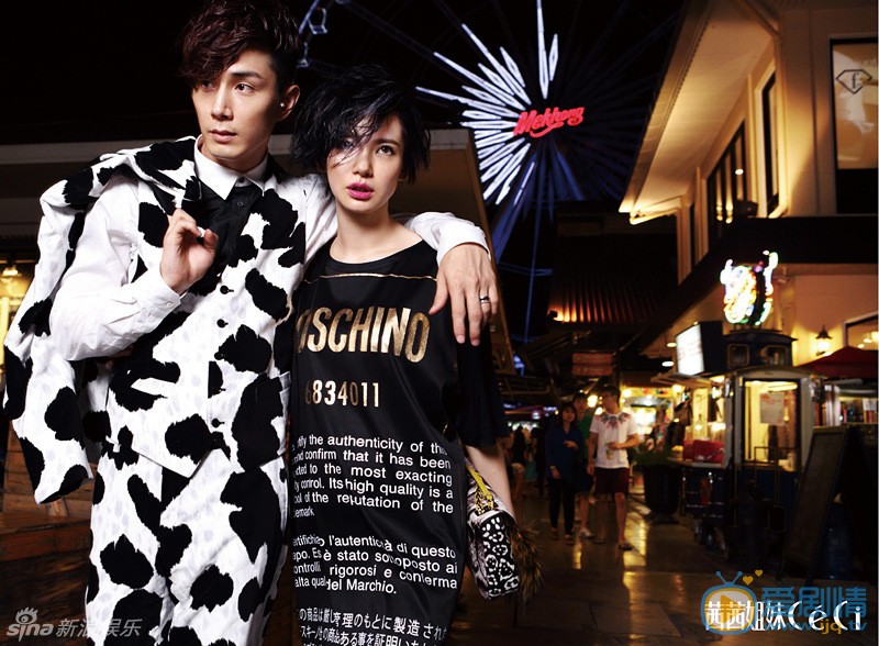 戚薇和李承铉身着Moschino 2014秋冬系列戚薇和李承铉身着Moschino 2014秋冬 红色针织女装套装、男士彩色字母以及条纹西装套装拍摄两人婚后的首度合作MV《Lucky Lucky》